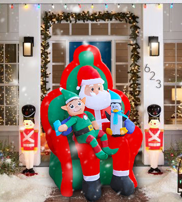 6Ft SeasonBlow Inflatable Christmas Santa Claus and Elf sitting on the sofa